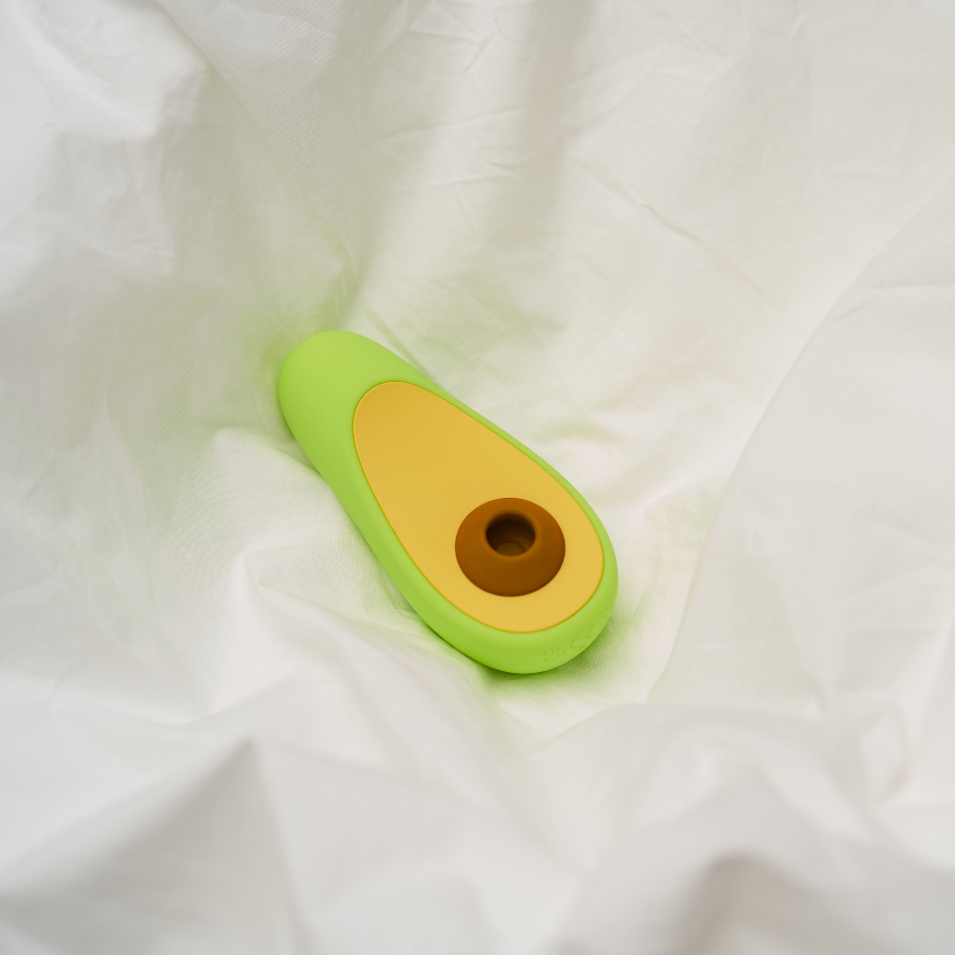 Avocado clitoral massager — charging setup