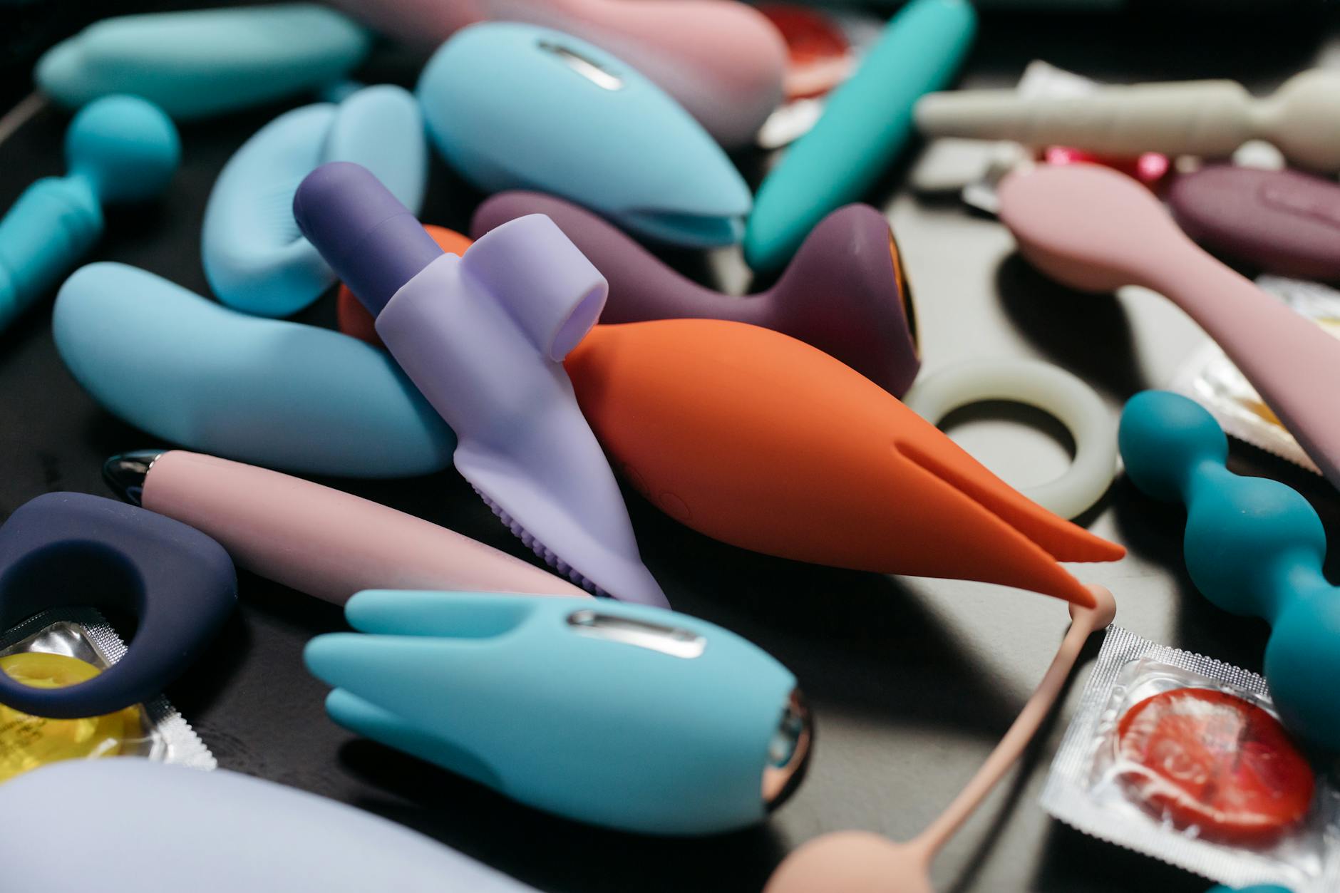 Close-up of vibrant clitoral vibrators arranged together