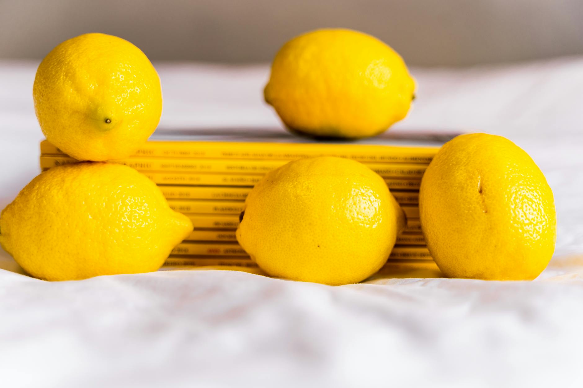 Fresh lemons on a white surface, symbolizing reset and renewal
